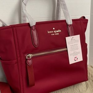 Brand new Kate spade cranberry color nylon tote with guitar strap-medium